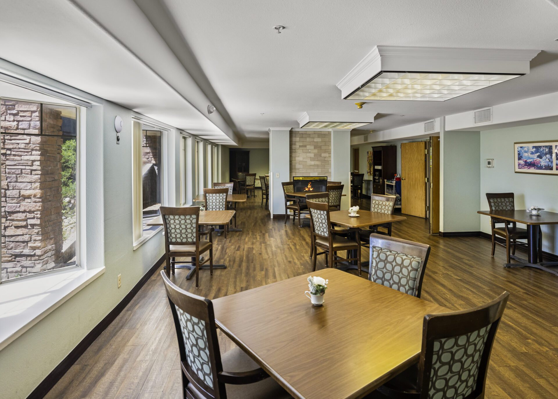 Bright Dining Area With Multiple Tables